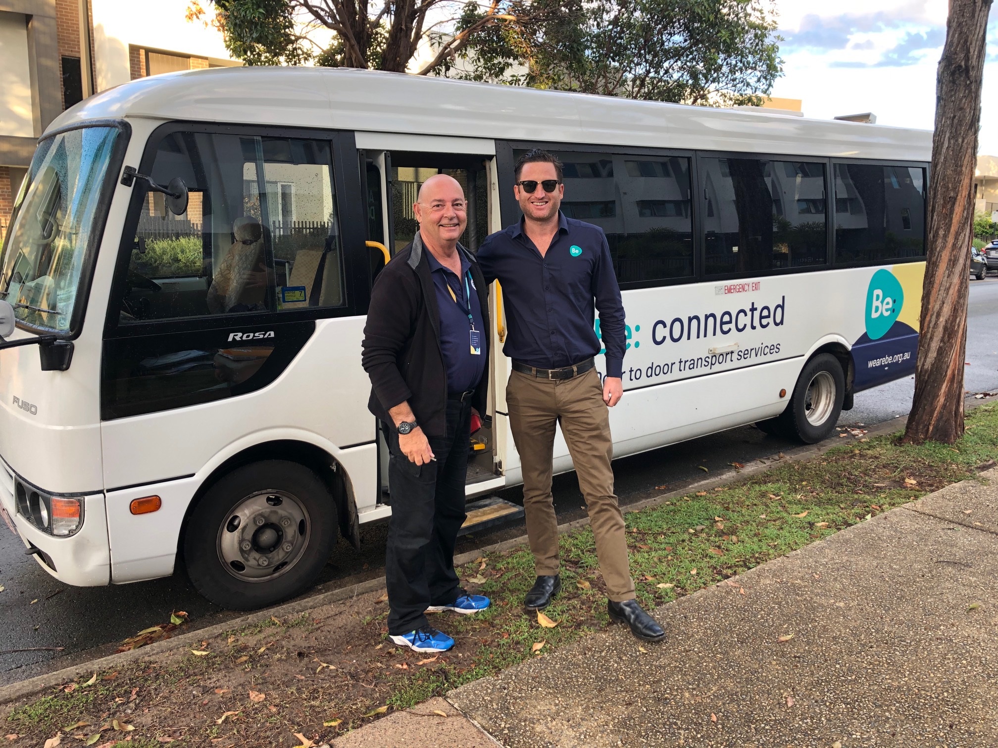 CEO and driver with bus